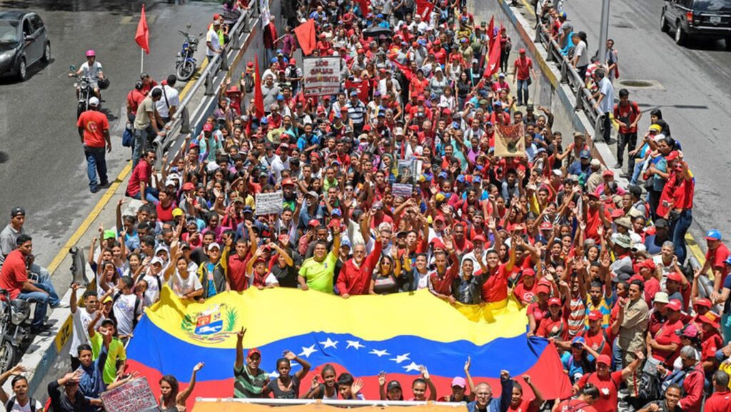 La militancia chavista en una movilización contra el recrudecimiento de las sanciones estadounidenses contra Venezuela en 2019 | Créditos: AFP